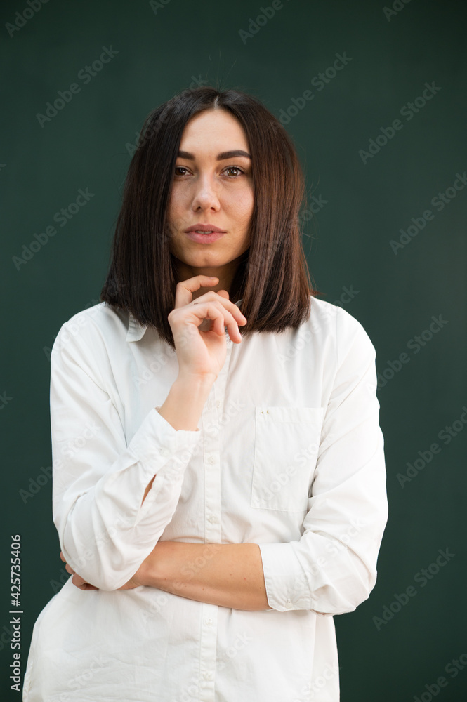 women in white robe on the green background women in white robe on the green background