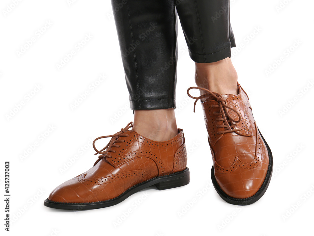 Woman in stylish shoes on white background, closeup