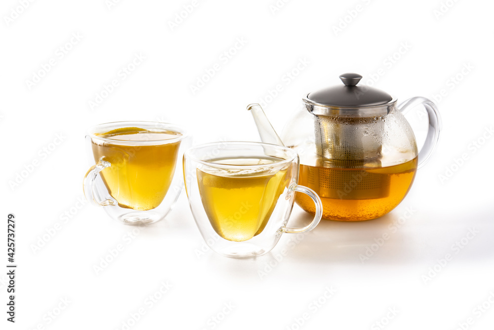 Ginger tea with lemon and honey in crystal glass isolated on white background Ginger tea with lemon and honey in crystal glass isolated on white background