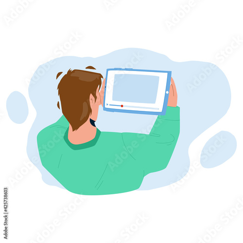 Man Watching Video On Tablet Digital Device Vector. Young Boy Watching Video On Electronic Gadget. Character Watch Online Movie Stream Or Film On Mobile Media Technology Flat Cartoon Illustration