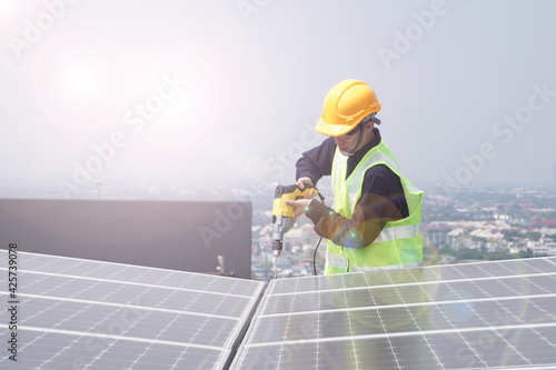 Engineer worker installing solar panels outdoors