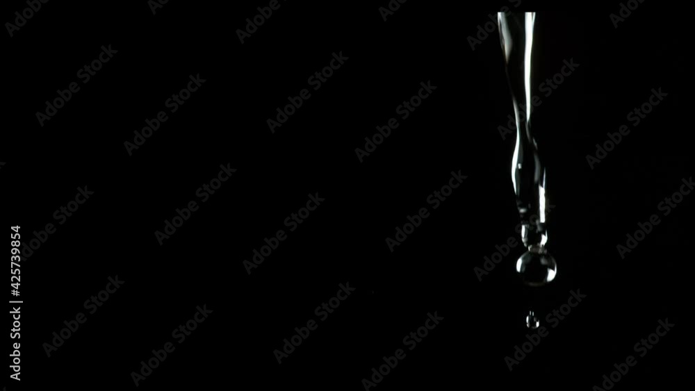 Super Slow motion of drop of water drips from the tap. Super Slow motion of drop of water drips from the tap.