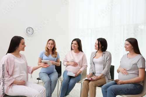 Obraz na plátně Group of pregnant women at courses for expectant mothers indoors
