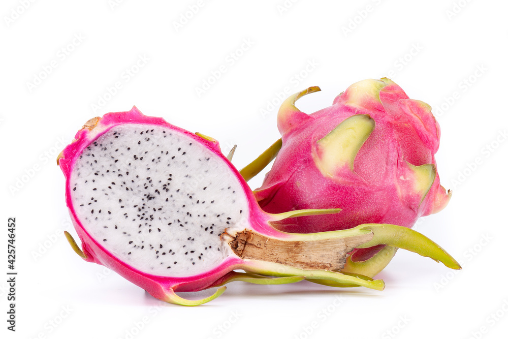 One whole and half dragon fruit Pitaya, on white background, isolated One whole and half dragon fruit Pitaya, on white background, isolated
