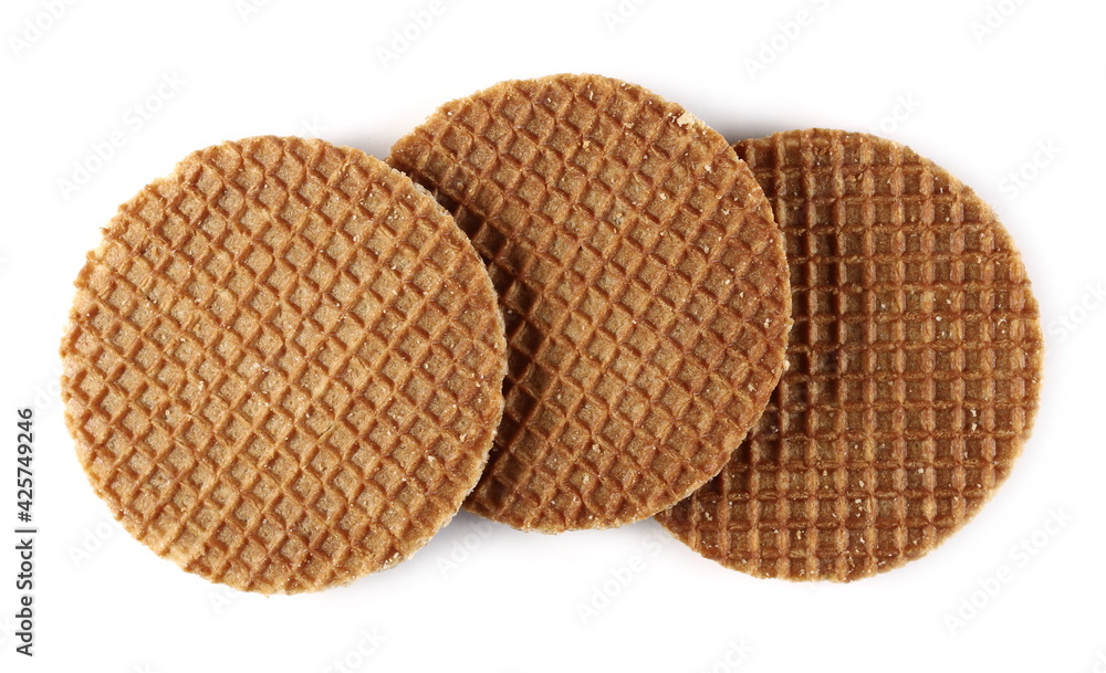 Dutch round waffles with honey isolated on white background, top view Dutch round waffles with honey isolated on white background, top view