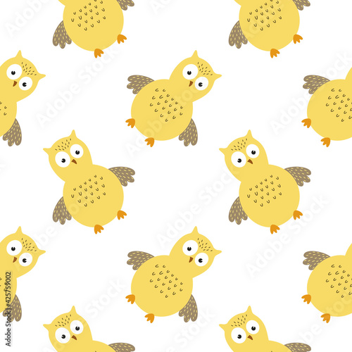 A seamless pattern with a cute yellow owl. Background for sewing children s clothing  printing on fabric and packaging paper.