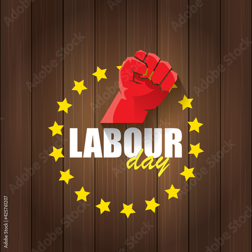 1 may Happy labour day vector label with strong protest fist in the air on wood background. vector happy labor day background or banner with man hand. workers may day poster
