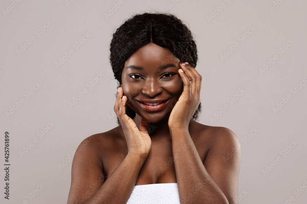 Beauty Concept. Attractive African American Female With Nude Makeup Touching Face Beauty Concept. Attractive African American Female With Nude Makeup Touching Face