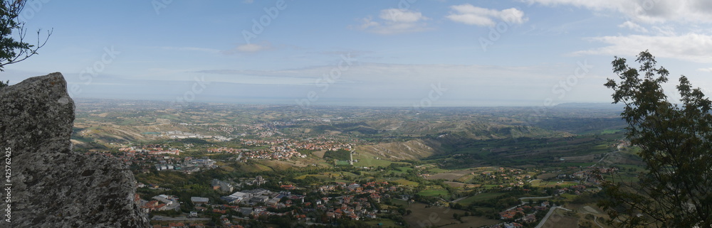 San Marino, the Witches Pass. Panorama of the path with the stairway carved into the rock towards the First Tower perched on a rock overlooking the surrounding area and the sea 