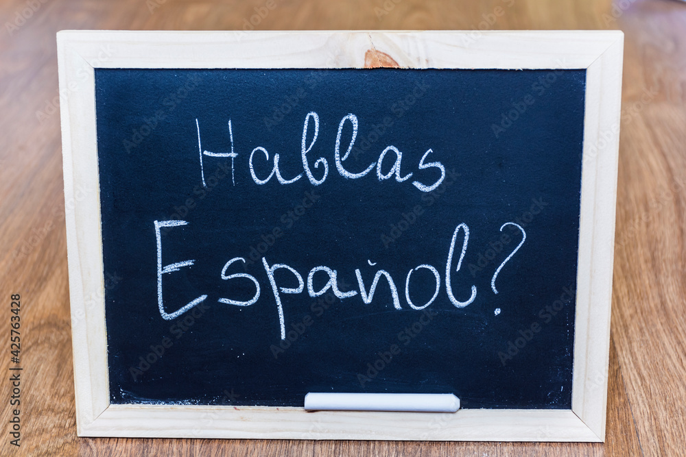 Learning Spanish Language Education Concept with Chalk Board and Hablas Espanol Meaning Do You Speak Spanish Learning Spanish Language Education Concept with Chalk Board and Hablas Espanol Meaning Do You Speak Spanish