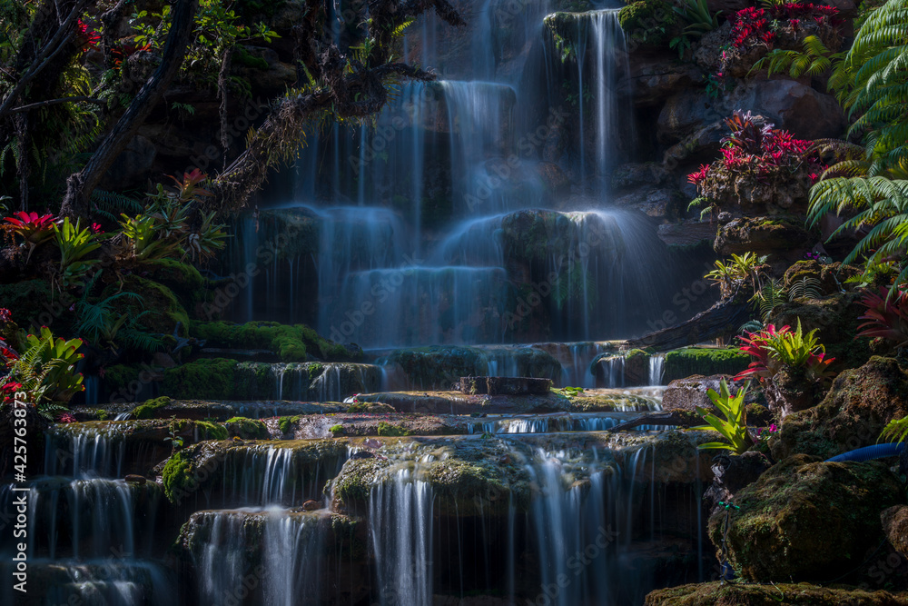 Obraz premium Wonderful waterfall in summer flowing at the tropical forest, Nice and amazing cascade, fantasy landscape