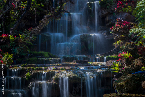 Wonderful waterfall in summer flowing at the tropical forest, Nice and amazing cascade, fantasy landscape