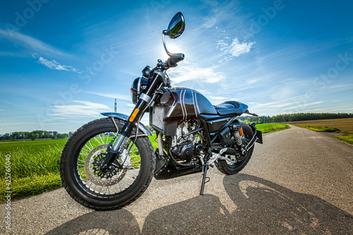 motorcycle in a sunny motorbike on the road riding. copyspace for your individual text.