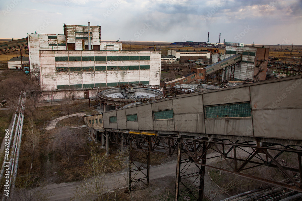 Outdated Soviet mining and processing plant. Industrial buildings.