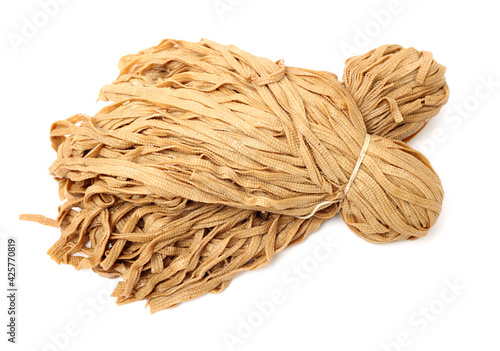 Shredded dried tofu noodles, chinese vegan food isolated on white background 