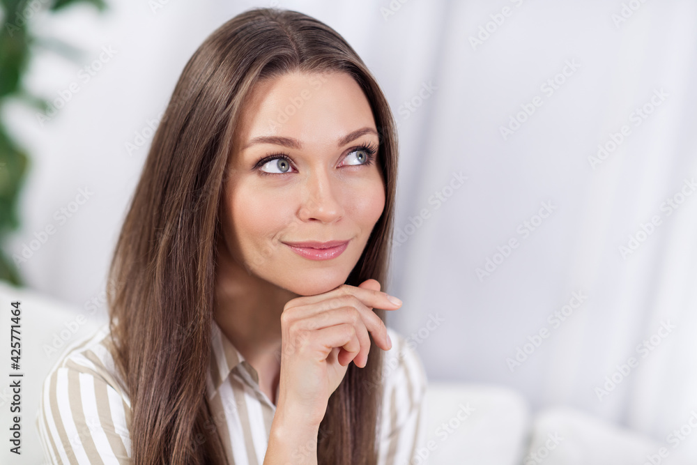 Photo portrait of dreamy thoughtful girl staying at home wearing casual shirt Photo portrait of dreamy thoughtful girl staying at home wearing casual shirt