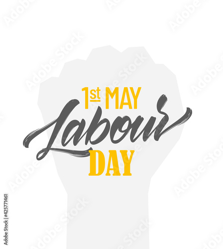 Vector lettering composition of Happy Labour Day 1st of May on clenched fist background.