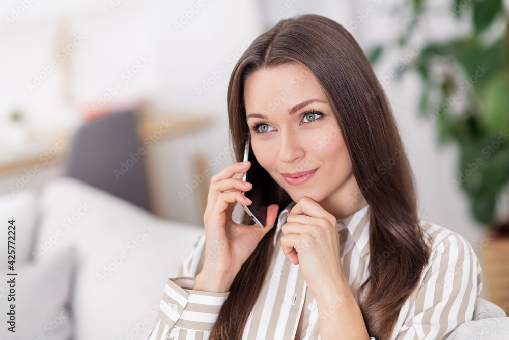 Photo portrait of thoughtful business woman talking on smartphone touching chin got idea Photo portrait of thoughtful business woman talking on smartphone touching chin got idea