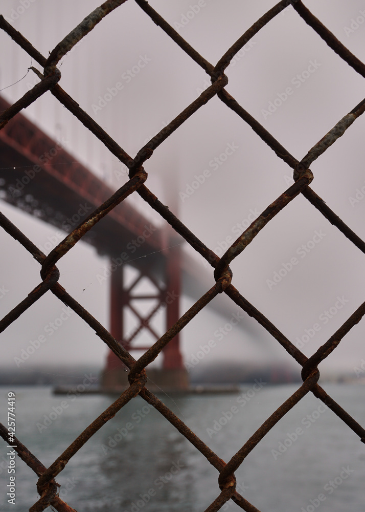 fence in front of golden gate bridge