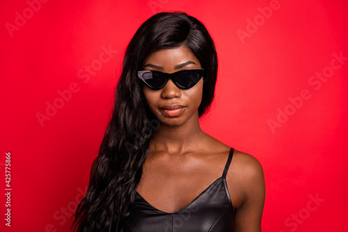 Wallpaper Mural Portrait of chic adorable alluring girl wearing cool dark specs isolated over bright red burgundy color background Torontodigital.ca