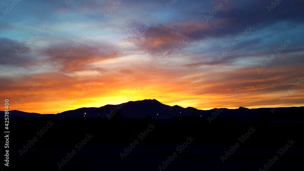 Sunrise over the mountains with colorful clouds