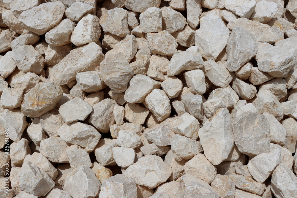 Large white and beige stones close-up. Stone background. Large white and beige stones close-up. Stone background.