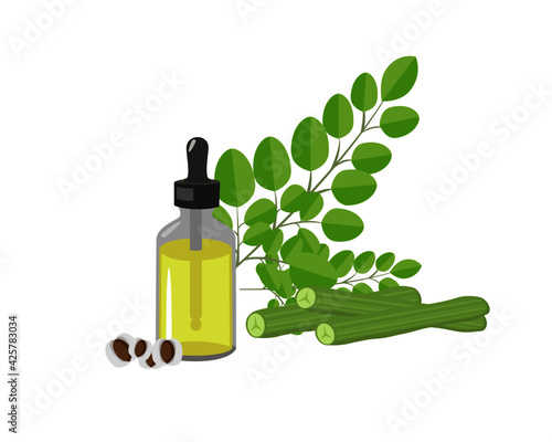 bottle of moringa essential oil with green leaves