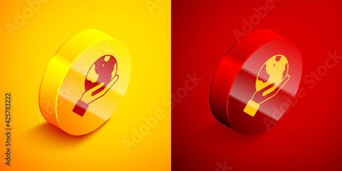 Isometric Human hand holding Earth globe icon isolated on orange and red background. Save earth concept. Circle button. Vector