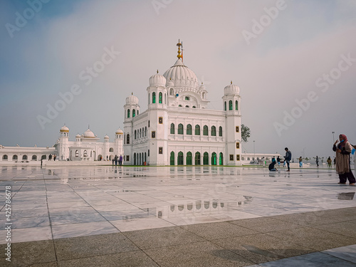 Gurdwara Sri Darbar Sahib, Kartarpur -   February, 14, 2021: Narowal, Pakistan, Opened on 09 Nov 2019, also claimed to be the largest Gurdwara in the world and second holiest site of Sikh Religion. photo