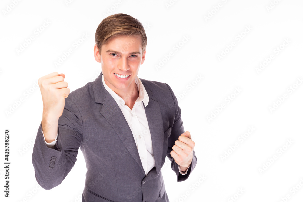 Excited caucasian business man with his arms on air stand over isolated on white background copy space Young handsome businessman celebrating with his fist Happy businessman portrait with smile face Excited caucasian business man with his arms on air stand over isolated on white background copy space Young handsome businessman celebrating with his fist Happy businessman portrait with smile face