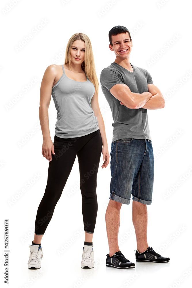 Full photo of happy strong sporty bodybuilders posing together Full photo of happy strong sporty bodybuilders posing together