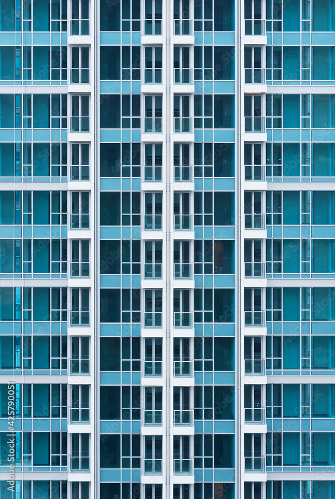 Exterior of high rise residential building. Modern architecture abstract background pattern Exterior of high rise residential building. Modern architecture abstract background pattern