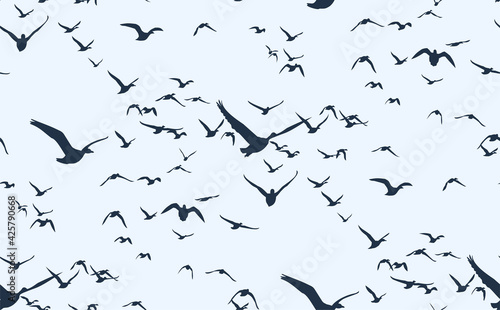The Seamless background with flight ducks in the sky.