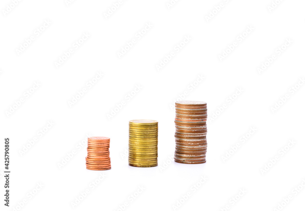 Stack of currency coins business idea growing investments and profits of business isolated on white background Stack of currency coins business idea growing investments and profits of business isolated on white background