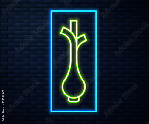 Glowing neon line Bunch of fresh green onions icon isolated on brick wall background. Vector