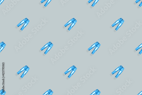 Denim pants seamless pattern. Bright background from jeans. 