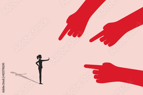 Woman is fighting back against employee bullying. Concept of discrimination at work, fight for rights and work abuse resistance.