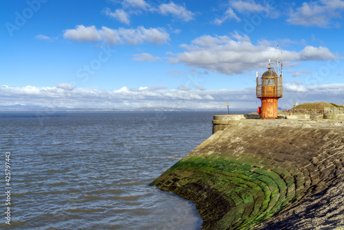 The red lighthouse at the entrance to Heysham harbour