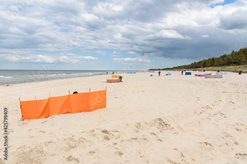 Windbreaks on the beach at Baltic sea photo