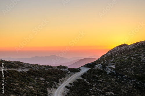 Beautiful Sunset over the Mountains of Crete Island, Greece. Panoramic View of the Horizon from the Mountain Top. Nice Colors in the Sky. Chania, Crete, Greece