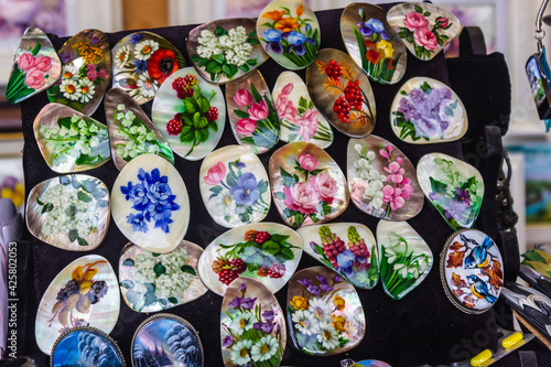 Russia, Rostov, July 2020. Pearl brooches with a floral pattern.