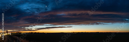 sunset near small town in rural America