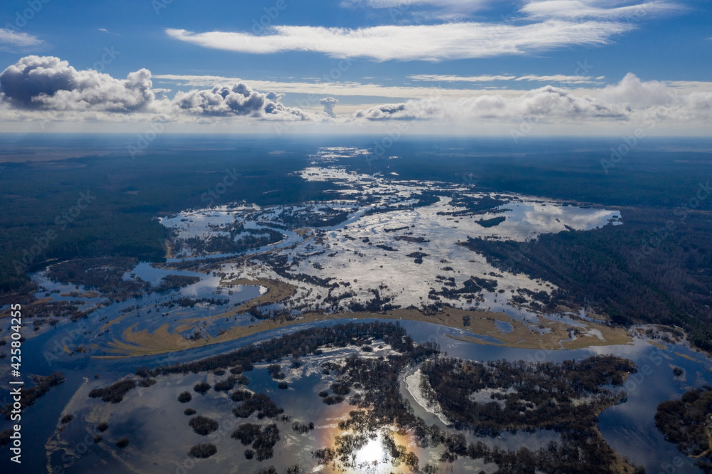 The Berezina River floods in the spring, the Dnieper River basin. A small river turns into a powerful stream. The Berezina River floods in the spring, the Dnieper River basin. A small river turns into a powerful stream.