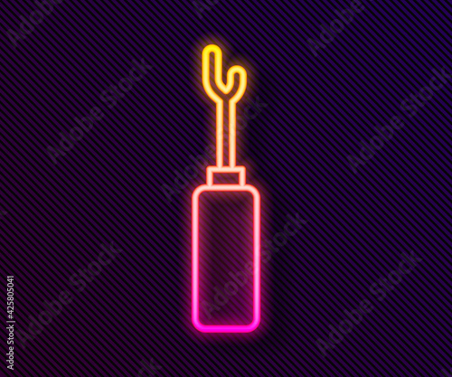 Glowing neon line Awl tool with wooden handle icon isolated on black background. Work equipment tailor industry. Vector