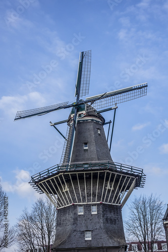 De Gooyer Windmill - Amsterdam most iconic mill. De Gooyer Windmill - was built in 1725 - the tallest wooden mill in the Netherlands. Amsterdam, Netherlands. © dbrnjhrj