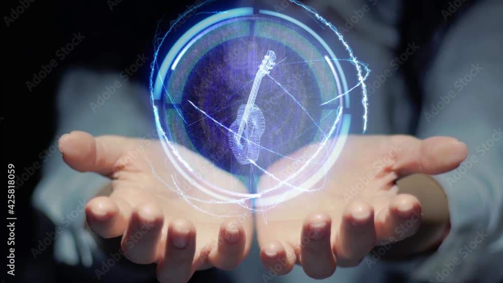 Female hands show a round conceptual hologram with guitar musical instrument. Unrecognizable woman in ashen white on a black background with future holographic technology Female hands show a round conceptual hologram with guitar musical instrument. Unrecognizable woman in ashen white on a black background with future holographic technology