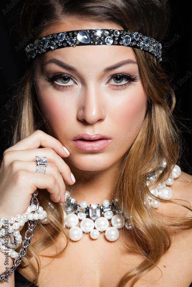 Perfect beauty and jewelry concept. Portrait of beautiful female model