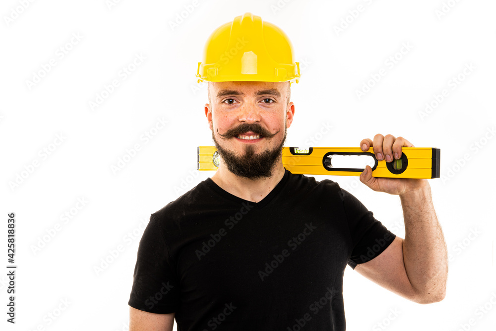 The man dressed in a black shirt poses in a photo studio. The man dressed in a black shirt poses in a photo studio.