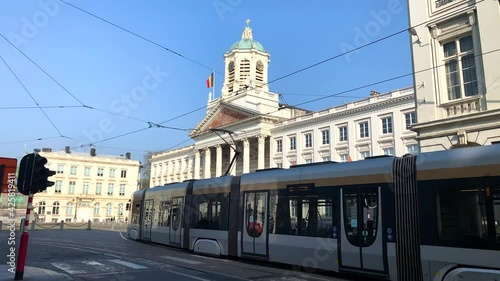 Real-time footage Electric tramway on its track during a sunny day