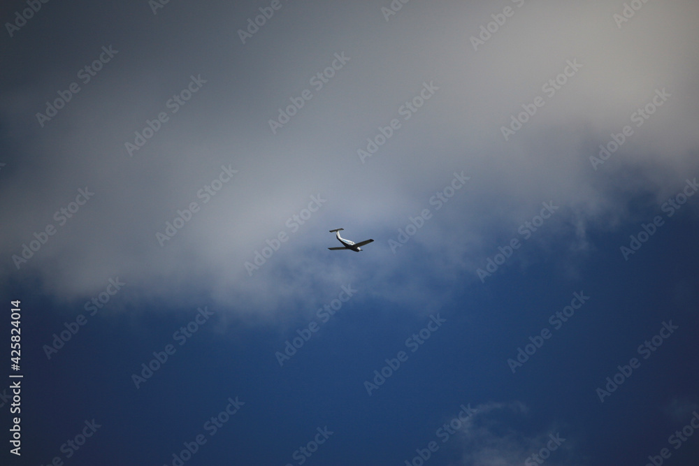 Clear blue skies with passengers being flown through it
